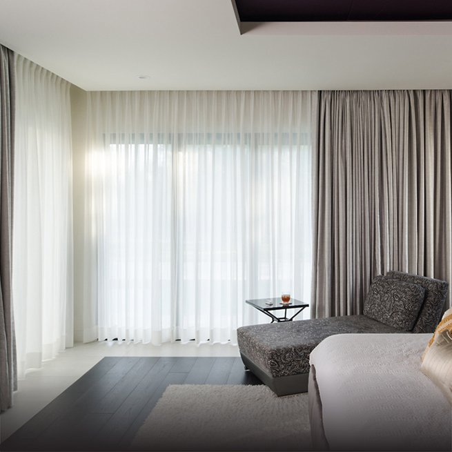 Motorized smart shades in Puerto Rico offering effortless light control through app and voice automation.