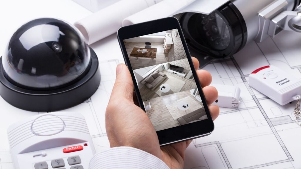Real-time home monitoring showing live camera feed on smartphone in Puerto Rico.