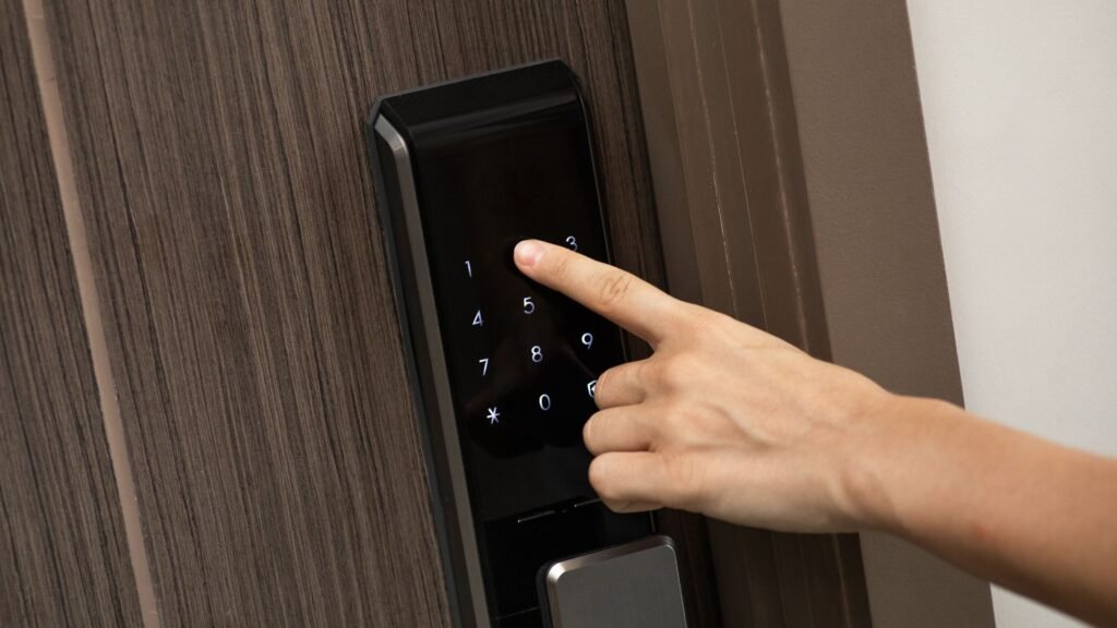 Technician installing smart lock for home security in Puerto Rico.